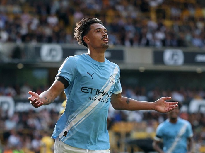 Soccer Football - Premier League - Wolverhampton Wanderers v Manchester City - Molineux Stadium, Wolverhampton, Britain - August 16, 2025 Manchester City's Tijjani Reijnders celebrates scoring their second goal Action Images via Reuters/Paul Childs EDITORIAL USE ONLY. NO USE WITH UNAUTHORIZED AUDIO, VIDEO, DATA, FIXTURE LISTS, CLUB/LEAGUE LOGOS OR 'LIVE' SERVICES. ONLINE IN-MATCH USE LIMITED TO 120 IMAGES, NO VIDEO EMULATION. NO USE IN BETTING, GAMES OR SINGLE CLUB/LEAGUE/PLAYER PUBLICATIONS. PLEASE CONTACT YOUR ACCOUNT REPRESENTATIVE FOR FURTHER DETAILS..