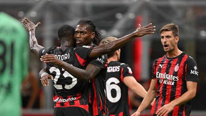 MILAN, ITALY - AUGUST 17: Rafael Leao celebrates with teammate Fikayo Tomori of AC Milan after scoring his teams first goal during the Coppa Italia match between AC Milan and SSC Bari at Stadio San Siro on August 17, 2025 in Milan, Italy. (Photo by Chris Ricco/Getty Images)