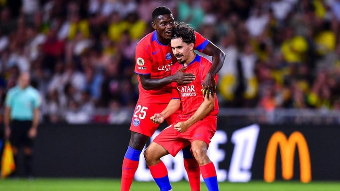 NANTES, FRANCE - AUGUST 17: Vitinha of PSG celebrates after scoring his teams first goal during the Ligue 1 McDonalds match between FC Nantes and Paris Saint-Germain FC at Stade de la Beaujoire on August 17, 2025 in Nantes, France. (Photo by Franco Arland/Getty Images)