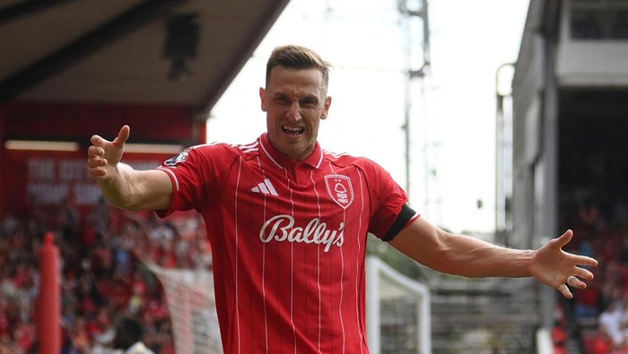 Soccer Football - Premier League - Nottingham Forest v Brentford - The City Ground, Nottingham, Britain - August 17, 2025 Nottingham Forests Chris Wood celebrates scoring their third goal REUTERS/Jaimi Joy EDITORIAL USE ONLY. NO USE WITH UNAUTHORIZED AUDIO, VIDEO, DATA, FIXTURE LISTS, CLUB/LEAGUE LOGOS OR LIVE SERVICES. ONLINE IN-MATCH USE LIMITED TO 120 IMAGES, NO VIDEO EMULATION. NO USE IN BETTING, GAMES OR SINGLE CLUB/LEAGUE/PLAYER PUBLICATIONS. PLEASE CONTACT YOUR ACCOUNT REPRESENTATIVE FOR FURTHER DETAILS..