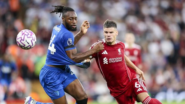 LIVERPOOL, ENGLAND - AUGUST 15: Antoine Semenyo of Bournemouth and Milos Kerkez of Bournemouth during the Premier League match between Liverpool and Bournemouth at Anfield on August 15, 2025 in Liverpool, England. (Photo by Robin Jones - AFC Bournemouth/AFC Bournemouth via Getty Images)