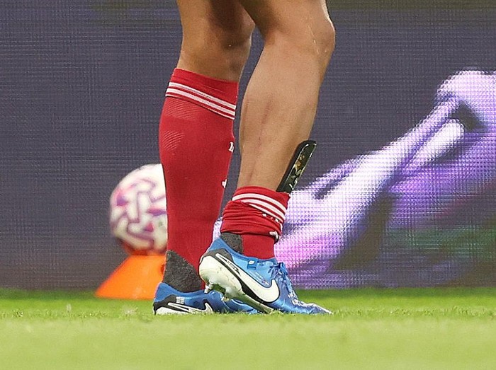 NEWCASTLE UPON TYNE, ENGLAND - AUGUST 25: A detailed view of the leg of Virgil van Dijk of Liverpool after being fouled by Anthony Gordon of Newcastle United (not pictured), which results in a red card following a VAR review to upgrade to the initial yellow card during the Premier League match between Newcastle United and Liverpool at St James' Park on August 25, 2025 in Newcastle upon Tyne, England. (Photo by George Wood/Getty Images)