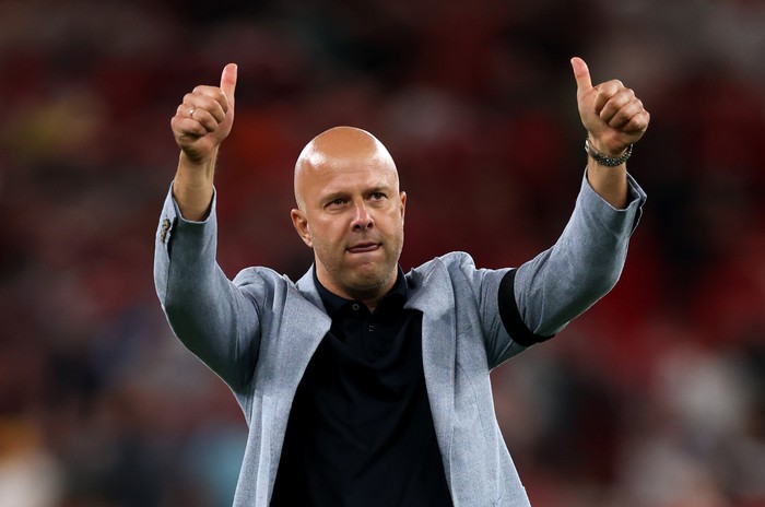 LIVERPOOL, ENGLAND - AUGUST 15: Arne Slot, Manager of Liverpool, acknowledges the fans after the teams victory in the Premier League match between Liverpool and Bournemouth at Anfield on August 15, 2025 in Liverpool, England. (Photo by Michael Steele/Getty Images)