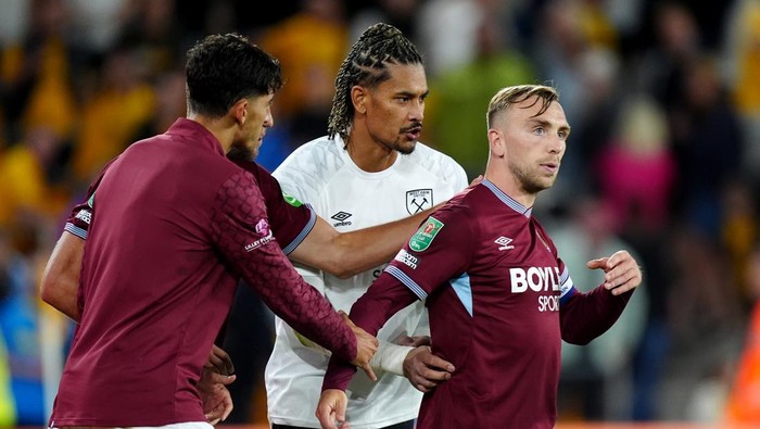 West Ham Uniteds Jarrod Bowen being pulled away from the fans after an argument at the final whistle after the Carabao Cup second round match at Molineux Stadium, Wolverhampton. Picture date: Tuesday August 26, 2025. (Photo by Mike Egerton/PA Images via Getty Images)