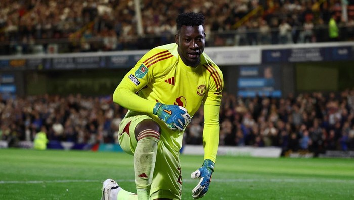 Andre Onana Soccer Football - Carabao Cup - Second Round - Grimsby Town v Manchester United - Blundell Park, Grimsby, Britain - August 27, 2025 Manchester United's Andre Onana during the penalty shoot-out Action Images via Reuters/Lee Smith EDITORIAL USE ONLY. NO USE WITH UNAUTHORIZED AUDIO, VIDEO, DATA, FIXTURE LISTS, CLUB/LEAGUE LOGOS OR 'LIVE' SERVICES. ONLINE IN-MATCH USE LIMITED TO 120 IMAGES, NO VIDEO EMULATION. NO USE IN BETTING, GAMES OR SINGLE CLUB/LEAGUE/PLAYER PUBLICATIONS. PLEASE CONTACT YOUR ACCOUNT REPRESENTATIVE FOR FURTHER DETAILS..