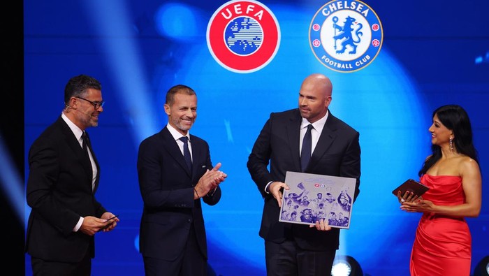 MONACO, MONACO - AUGUST 28: Jason Gannon, President and Chief Operating Officer of Chelsea recieves an award to recognise Chelseas achievements for winning all the UEFA Mens Club Competitions during the UEFA Champions League 2025/26 League Phase Draw at Grimaldi Forum on August 28, 2025 in Monaco, Monaco.  (Photo by Francesco Scaccianoce - UEFA/UEFA via Getty Images)