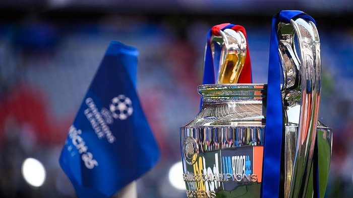 MUNICH, GERMANY - MAY 31: The UEFA Champions League logo on a corner flag and the UEFA Champions League trophy are seen prior to the UEFA Champions League Final 2025 between Paris Saint-Germain and FC Internazionale Milano at Munich Football Arena on May 31, 2025 in Munich, Germany. (Photo by Kevin Voigt/GettyImages)