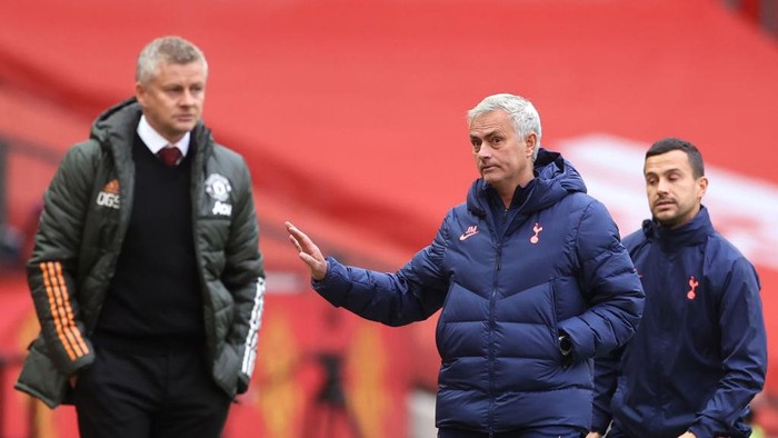 Manchester United manager Ole Gunnar Solskjaer (left) and Tottenham Hotspur manager Jose Mourinho on the touchline during the Premier League match at Old Trafford, Manchester. (Photo by Carl Recine/PA Images via Getty Images)