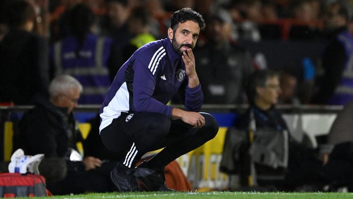 GRIMSBY, ENGLAND - AUGUST 27: Ruben Amorim, Manager of Manchester United, looks dejected after his team concede during the Carabao Cup Second Round match between Grimsby Town and Manchester United at Blundell Park on August 27, 2025 in Grimsby, England.  (Photo by Shaun Botterill/Getty Images)