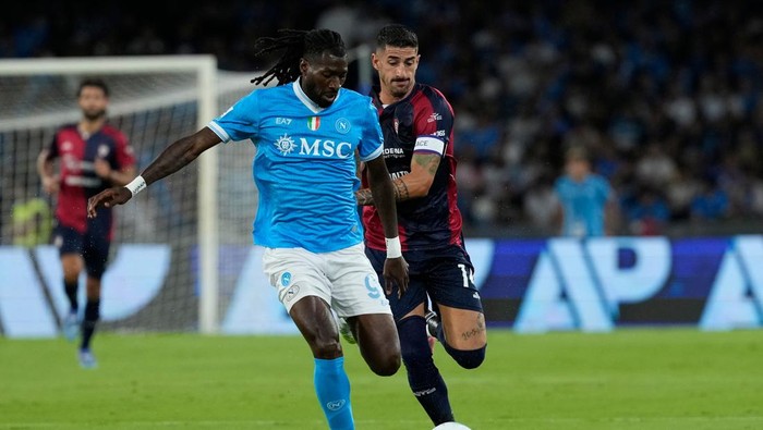 Andre-Frank Zambo Anguissa of SSC Napoli competes for the ball with Alessandro Deiola of Cagliari Calcio during the Serie A match between SSC Napoli and Cagliari Calcio at Stadio Diego Armando Maradona Naples Italy on 30 August 2025. (Photo by Franco Romano/NurPhoto via Getty Images)