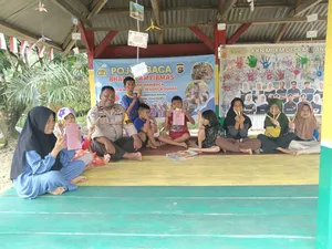 Aipda Wawan Bangun Pojok Baca di Kampar, Selipkan Imbauan Kamtibmas ke Warga Aipda Wawan Bangun Pojok Baca di Kampar, Selipkan Imbauan Kamtibmas ke Warga