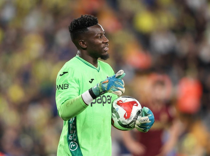 ISTANBUL, TURKEY - SEPTEMBER 14: Andre Onana of Trabzonspor looks on during the Trendyol Süper Lig match between Fenerbahçe SK and Trabzonspor at Ulker Sukru Saracoglu Stadium on September 14, 2025 in Istanbul, Turkey. (Photo by Ahmad Mora/Getty Images)