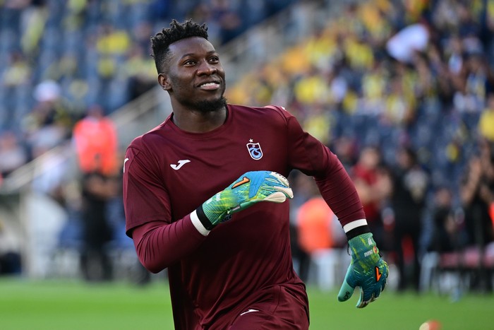 ISTANBUL, TURKIYE - SEPTEMBER 14: Andre Onana of Trabzonspor warms up ahead of the Turkish Super Lig Week 5 match against Fenerbahce, Istanbul, Turkiye on September 14, 2025. (Photo by Serhat Cagdas/Anadolu via Getty Images)