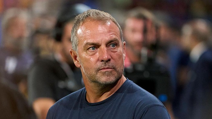 BARCELONA, SPAIN - SEPTEMBER 14: Hansi Flick, head coach of FC Barcelona, stands on the touchline prior to the match during the LaLiga EA Sports match between FC Barcelona and Valencia CF at Estadi Johan Cruyff on September 14, 2025 in Barcelona, Spain. (Photo by Pedro Salado/Getty Images)