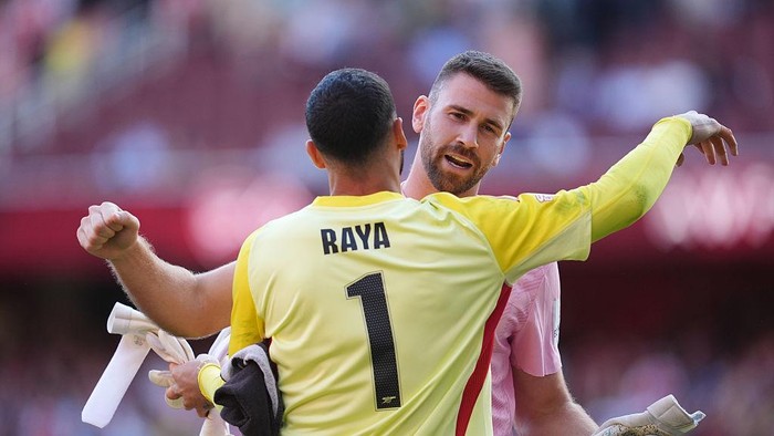 Arsenals David Raya and Athletic Bilbaos Unai Simon embrace after the penalty shootout during an Emirates Cup match at Emirates Stadium, London. Picture date: Saturday August 9, 2025. (Photo by John Walton/PA Images via Getty Images)