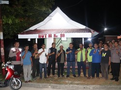 Kapolres Pelalawan Cek Pos Kamling, Ajak Warga Aktif Jaga Lingkungan