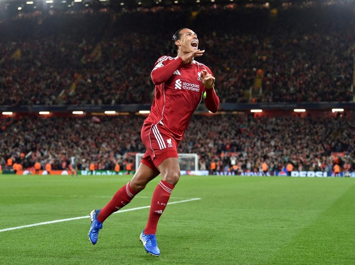 Soccer Football - UEFA Champions League - Liverpool v Atletico Madrid - Anfield, Liverpool, Britain - September 17, 2025 Liverpool's Virgil van Dijk celebrates scoring their third goal REUTERS/Peter Powell TPX IMAGES OF THE DAY
