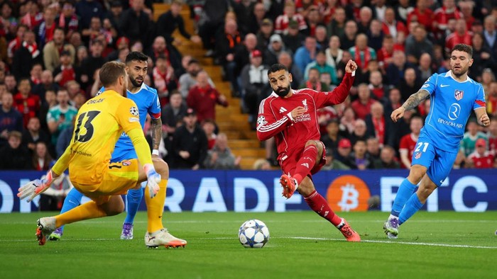 Soccer Football - UEFA Champions League - Liverpool v Atletico Madrid - Anfield, Liverpool, Britain - September 17, 2025 Liverpools Mohamed Salah scores their second goal Action Images via Reuters/Andrew Boyers
