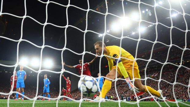 Soccer Football - UEFA Champions League - Liverpool v Atletico Madrid - Anfield, Liverpool, Britain - September 17, 2025 Liverpool's Andy Robertson scores their first goal Action Images via Reuters/Andrew Boyers