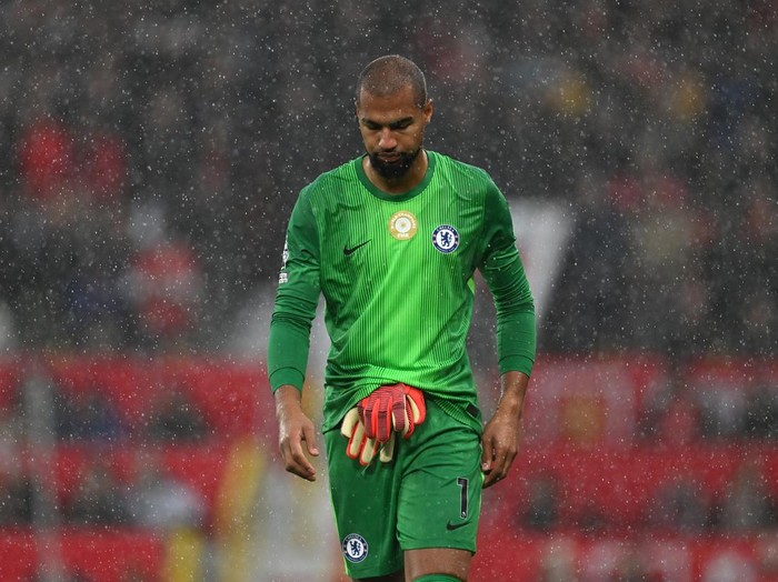 MANCHESTER, ENGLAND - SEPTEMBER 20: Robert Sanchez of Chelsea looks dejected after being shown a red card for a foul on Bryan Mbeumo of Manchester United (not pictured) during the Premier League match between Manchester United and Chelsea at Old Trafford on September 20, 2025 in Manchester, England. (Photo by Darren Walsh/Chelsea FC via Getty Images)