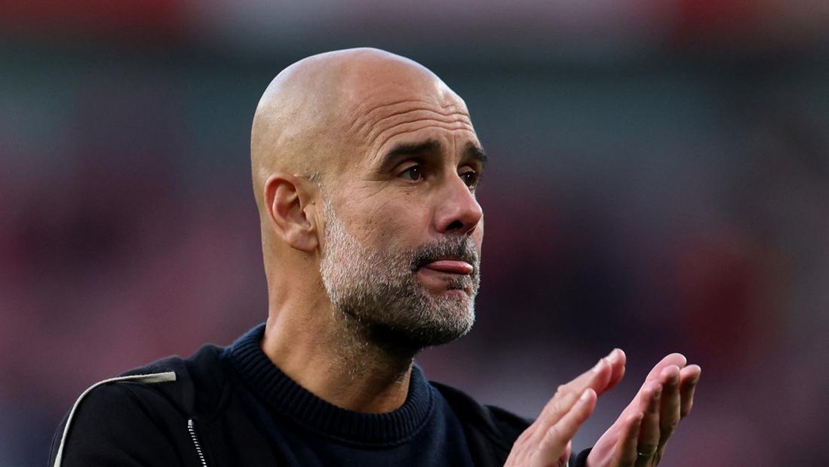 Manajer City Pep Guardiola sebenarnya tidak ingin main bertahan lawan Arsenal. (REUTERS/Hannah McKay)