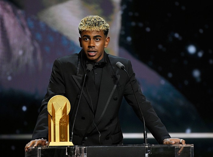 PARIS, FRANCE - SEPTEMBER 22: Lamine Yamal speaks on stage with the Men's Kopa Trophy during the 69th Ballon D'Or Ceremony at Theatre Du Chatelet on September 22, 2025 in Paris, France. (Photo by Kristy Sparow - UEFA/UEFA via Getty Images)