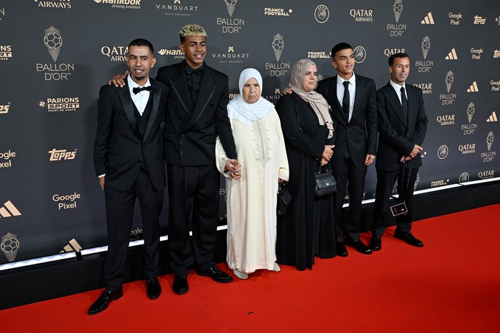 PARIS, FRANCE - SEPTEMBER 22: Lamine Yamal and Family attend the 69th Ballon DOr Photocall at Theatre Du Chatelet on September 22, 2025 in Paris, France. (Photo by Kristy Sparow - UEFA/UEFA via Getty Images)