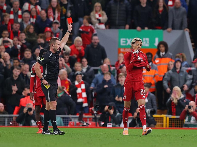 LIVERPOOL, ENGLAND - SEPTEMBER 23: Hugo Ekitike of Liverpool is shown a red card after scoring their side's second goal during the Carabao Cup Third Round match between Liverpool and Southampton at Anfield on September 23, 2025 in Liverpool, England. (Photo by James Gill - Danehouse/Getty Images)