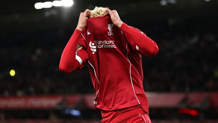 LIVERPOOL, ENGLAND - SEPTEMBER 23: (THE SUN OUT, THE SUN ON SUNDAY OUT) Hugo Ekitike of Liverpool celebrates scoring his teams second goal by removing his match shirt and subsequently receives a second yellow card from Referee Thomas Bramall (not pictured) to be sent off during the Carabao Cup Third Round match between Liverpool and Southampton at Anfield on September 23, 2025 in Liverpool, England. (Photo by Liverpool FC/Liverpool FC via Getty Images)
