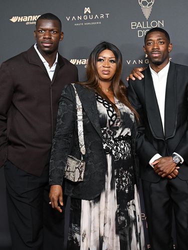 PARIS, FRANCE - SEPTEMBER 22: Moustapha Diatta, Fatimata Dembele, Ousmane Dembélé, guest and Ousmane Dembélé Sr. attends the 69th Ballon D'Or Photocall at Theatre Du Chatelet on September 22, 2025 in Paris, France. (Photo by Stephane Cardinale - Corbis/Corbis via Getty Images)