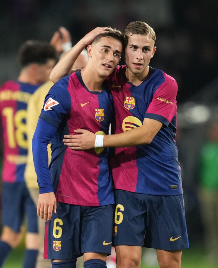 Gavi, Fermin Lopez BARCELONA, SPAIN - OCTOBER 20: Gavi and Fermin Lopez of FC Barcelona embrace at full-time following the team's victory in the La Liga EA Sports match between FC Barcelona and Sevilla FC at Estadi Olimpic Lluis Companys on October 20, 2024 in Barcelona, Spain. (Photo by Alex Caparros/Getty Images)