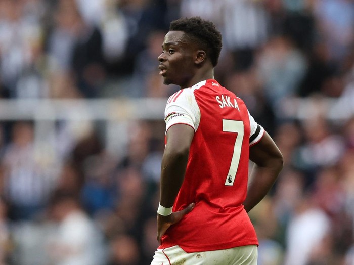 Soccer Football - Premier League - Newcastle United v Arsenal - St James' Park, Newcastle, Britain - September 28, 2025 Arsenal's Bukayo Saka reacts at half time REUTERS/Scott Heppell EDITORIAL USE ONLY. NO USE WITH UNAUTHORIZED AUDIO, VIDEO, DATA, FIXTURE LISTS, CLUB/LEAGUE LOGOS OR 'LIVE' SERVICES. ONLINE IN-MATCH USE LIMITED TO 120 IMAGES, NO VIDEO EMULATION. NO USE IN BETTING, GAMES OR SINGLE CLUB/LEAGUE/PLAYER PUBLICATIONS. PLEASE CONTACT YOUR ACCOUNT REPRESENTATIVE FOR FURTHER DETAILS..
