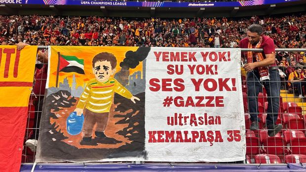 ISTANBUL, TURKIYE - SEPTEMBER 30: Galatasaray fans display a banner reading 'No food. No water. No voice. Gaza.' in support of Gaza during the UEFA Champions League week 2 match between Galatasaray and Liverpool at RAMS Park in Istanbul, Turkiye, on September 30, 2025. (Photo by Abdulhamid Hosbas/Anadolu via Getty Images)