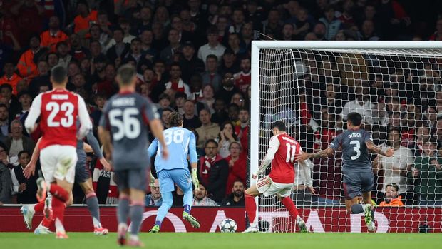 Soccer Football - UEFA Champions League - Arsenal v Olympiacos - Emirates Stadium, London, Britain - October 1, 2025 Arsenal's Gabriel Martinelli scores their first goal Action Images via Reuters/Andrew Boyers