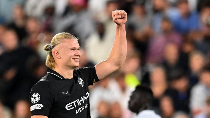 Soccer Football - UEFA Champions League - AS Monaco v Manchester City - Stade Louis II, Monaco - October 1, 2025 Manchester Citys Erling Haaland celebrates scoring their second goal REUTERS/Alexandre Dimou