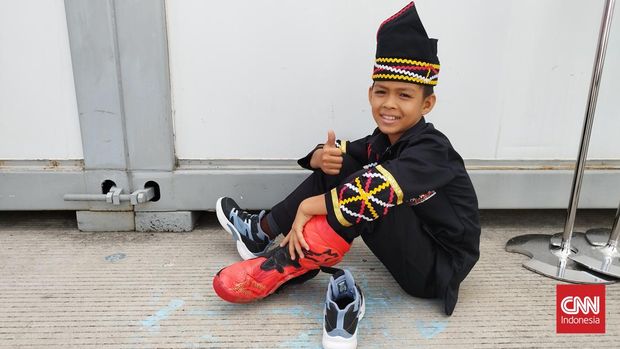 Rayyan Arkhan Dika Pacu Jalur, MotoGP, sepatu marquez. CNNIndonesia/Jun Mahares