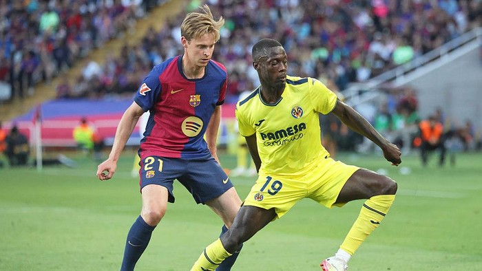 Nicolas Pepe and Frenkie de Jong play during the match between FC Barcelona and Villarreal CF, corresponding to week 37 of LaLiga EA Sports, at the Olympic Stadium Lluis Companys in Barcelona, Spain, on May 18, 2025. (Photo by Joan Valls/Urbanandsport/NurPhoto via Getty Images)