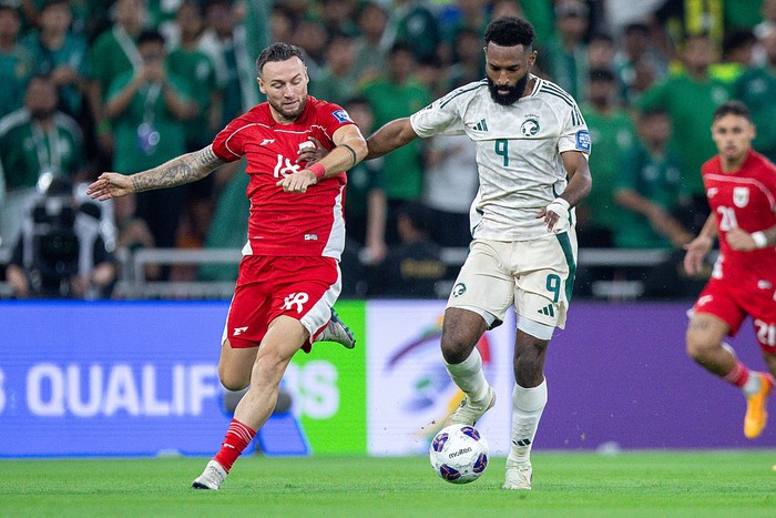 JEDDAH, SAUDI ARABIA - OCTOBER 8:  Firas Al Braikan of Saudi Arabia challenged by Marc Klok of Indonesia during the AFC Asian qualifiers 4th Round Group B match between Saudi Arabia and Indonesia at King Abdullah Sports City on October 8, 2025 in Jeddah, Saudi Arabia. (Photo by Yasser Bakhsh/Getty Images)