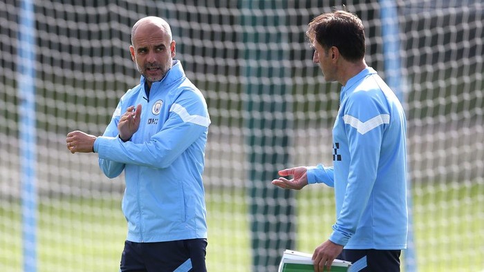 Manchester City manager Pep Guardiola (left) and performance analysis coach Carles Planchart during a training session at the City Football Academy, Manchester. Picture date: Monday September 5, 2022. (Photo by Barrington Coombs/PA Images via Getty Images)