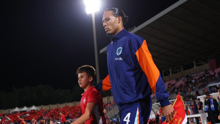 MOSTA, MALTA - OCTOBER 09: Virgil van Dijk of Netherlands leads the team out prior to the FIFA World Cup 2026 qualifier match between Malta and Netherlands at TaQali National Stadium on October 09, 2025 in Mosta, Malta. (Photo by Molly Darlington - UEFA/UEFA via Getty Images)