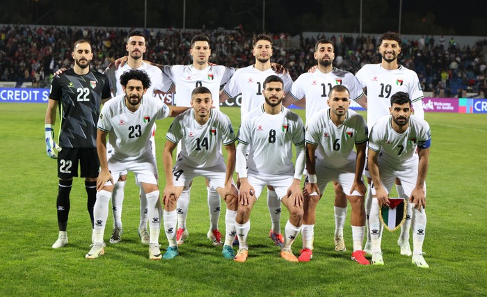 The Palestinian national team poses for a photo before the 2026 FIFA World Cup qualifying match between Palestine and Iraq at the Amman International Stadium in Amman, Jordan, on March 25, 2025. (Photo by Ameen Ahmed/NurPhoto via Getty Images)