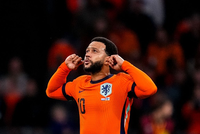 Memphis Depay AMSTERDAM, NETHERLANDS - OCTOBER 12: Memphis Depay of Netherlands celebrates after scoring his team's third goal during the FIFA World Cup 2026 qualifier match between Netherlands and Finland at Johan Cruijff Arena on October 12, 2025 in Amsterdam, Netherlands. (Photo by Rene Nijhuis/MB Media/Getty Images)