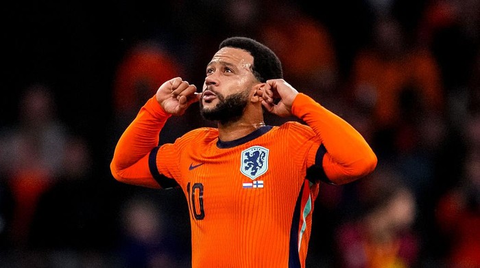 AMSTERDAM, NETHERLANDS - OCTOBER 12: Memphis Depay of Netherlands celebrates after scoring his teams third goal during the FIFA World Cup 2026 qualifier match between Netherlands and Finland at Johan Cruijff Arena on October 12, 2025 in Amsterdam, Netherlands. (Photo by Rene Nijhuis/MB Media/Getty Images)