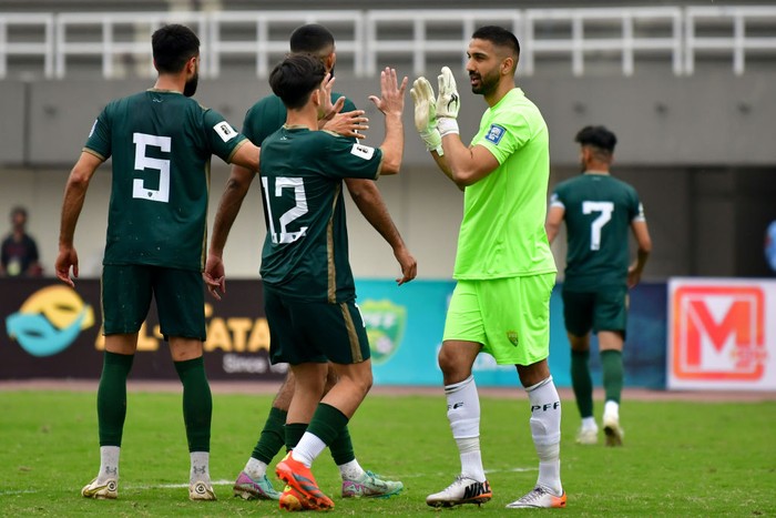 The Indian team players are lining up before the qualification 2nd round for the FIFA World Cup 2026 and AFC Asian Cup 2027 group A match between Qatar and India at Jassim Bin Hamad Stadium in Qatar, on June 11, 2024. (Photo by Noushad Thekkayil/NurPhoto via Getty Images)