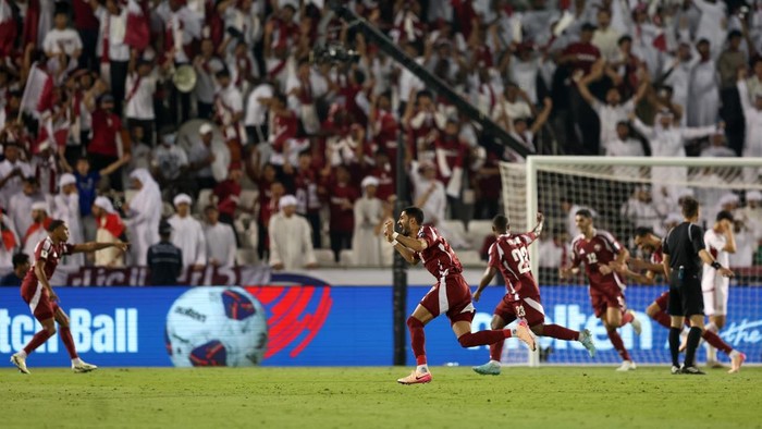 DOHA, QATAR - OCTOBER 14: Sultan Al Brake of Qatar celebrates his teams first goal scored by teammate Boualem Khoukhi (not pictured) during the FIFA World Cup 2026 qualifier match between Qatar and United Arab Emirates at Jassim Bin Hamad Stadium on October 14, 2025 in Doha, Qatar. (Photo by Mohamed Farag/Getty Images)