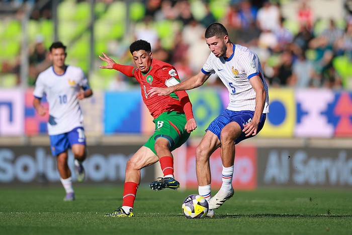 VALPARAISO, CHILE - OCTOBER 15: Elyaz Zidane of France battles for possession against Houssam Essadak of Morocco during the FIFA U-20 World Cup Chile 2025 semi-final match between Morocco and France at Estadio Elías Figueroa Brander on October 15, 2025 in Valparaiso, Chile. (Photo by Hector Vivas - FIFA/FIFA via Getty Images)