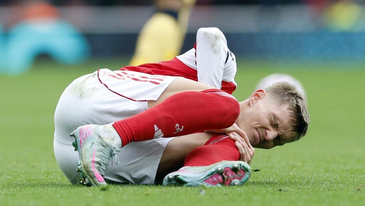 Martin Odegaard absen beberapa pekan karena cedera lutut. (Action Images via Reuters/Peter Cziborra)