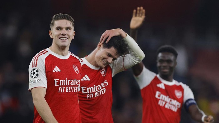 Soccer Football - UEFA Champions League - Arsenal v Atletico Madrid - Emirates Stadium, London, Britain - October 21, 2025 Arsenals Viktor Gyokeres and Christian Norgaard celebrate after the match Action Images via Reuters/Andrew Couldridge