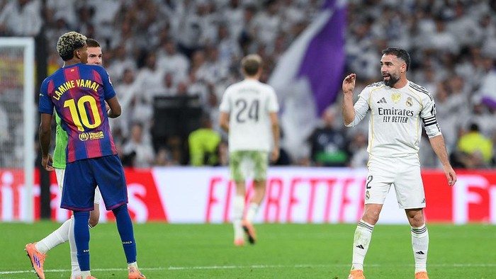 2243452174 MADRID, SPAIN - OCTOBER 26: Dani Carvajal of Real Madrid gestures towards Lamine Yamal of FC Barcelona after the LaLiga EA Sports match between Real Madrid CF and FC Barcelona at Estadio Santiago Bernabeu on October 26, 2025 in Madrid, Spain. (Photo by David Ramos/Getty Images)