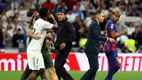Vinicius tampak melakukan konfrontasi ke Yamal, diduga lantaran komentar-komentar si pesepakbola Barcelona menjelang El Clasico. Foto: REUTERS/Susana Vera Vinicius tampak melakukan konfrontasi ke Yamal, diduga lantaran komentar-komentar si pesepakbola Barcelona menjelang El Clasico. Foto: REUTERS/Susana Vera